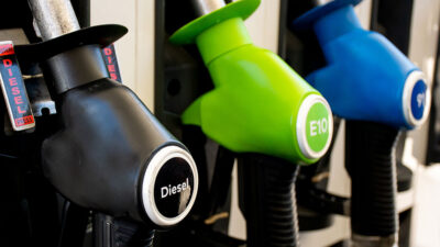 Various gasoline pumps on a gas station. Fuel nozzles oil dispensers. Petrol gas diesel fuel prices concept